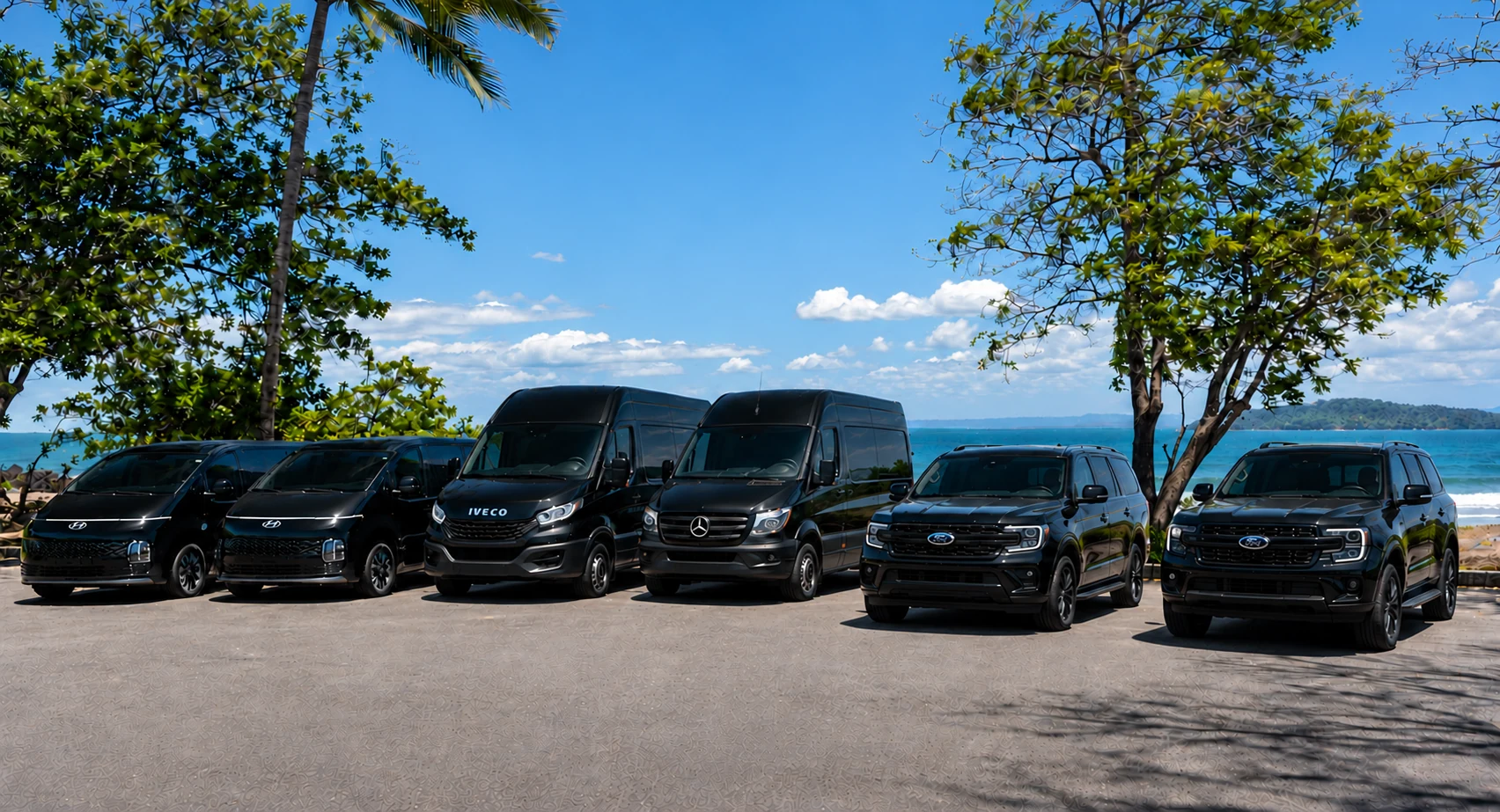 Black Car CR fleet lined up in front of the beach in Costa Rica